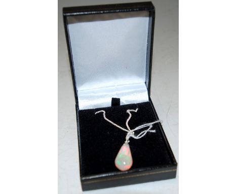 A 9ct Ethiopian Welo opal pendant on chain 