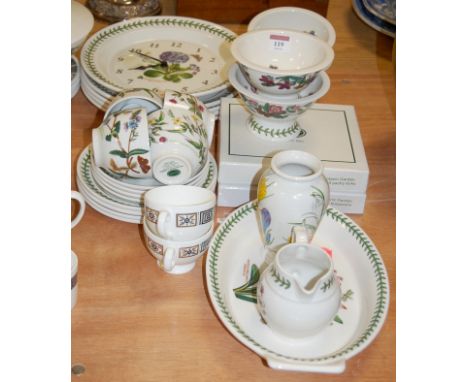 A collection of assorted Portmeirion Botanic Garden pattern wares to include wall clock, teacups and saucers etc