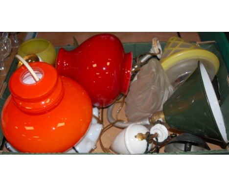 A box of assorted glass shades to include 1960s orange glass ceiling light fitting