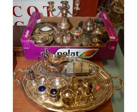 A collection of miscellaneous silver plated wares to include three piece tea service, candelabra, twin handled tray etc