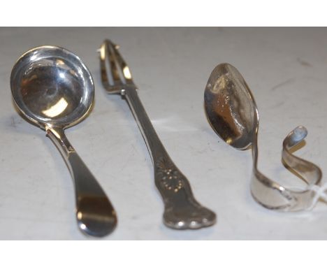 An early 20th century silver pickle fork in the Kings pattern, and a baby's spoon, and one other (3)