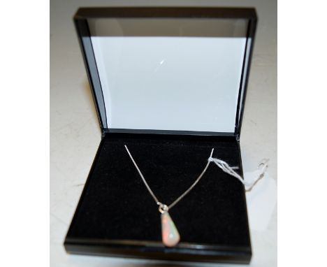 A contemporary opal pendant from Ethiopia's Welo mine, on silver finelink chain 