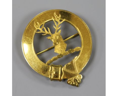 A 1930's 9ct gold Scottish Iona stags head and garter cloak brooch, 8.8 grams, 45mm