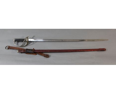 A George VI Royal Artillery dress sword and leather covered scabbard, the etched blade by Wilkinson Sword Ltd. stamped no. 67