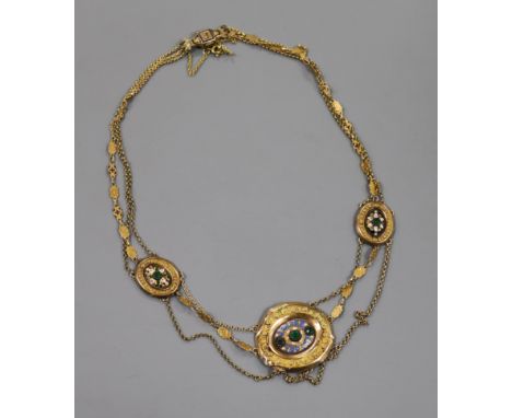 A 19th century French yellow metal, enamel and paste set double strand necklace, 42cm.