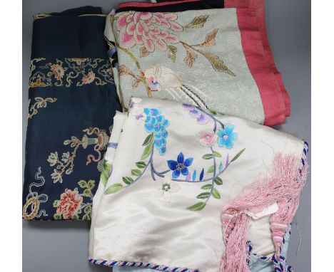A Chinese silk knot embroidered panel and two later embroidered panels