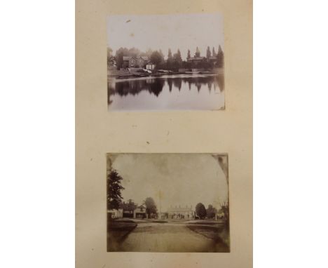 Late 19th/early 20th century photos and commemoratives, to include an album of Victorian photographic family portraits, a Geo