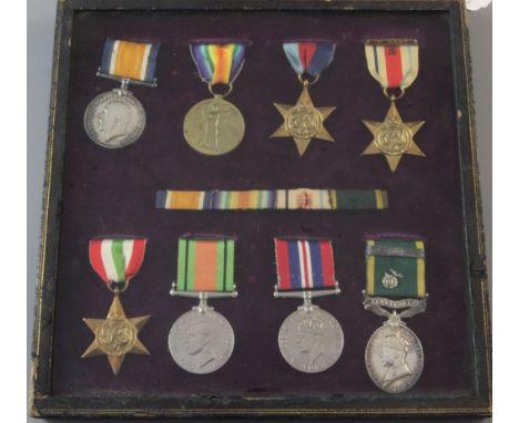 A WWI and WWII group of 8 to 306560 Corporal E R Parsons, Hampshire Regiment, including a George VI (2nd type) Efficiency med