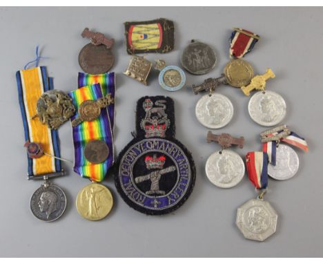 A WWI pair to 0101056 Private H. Diggins, Army Ordnance Corps, together with other various medals and badges