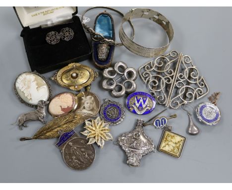 A collection of silver jewellery etc. including buckle, bangle and cameo.