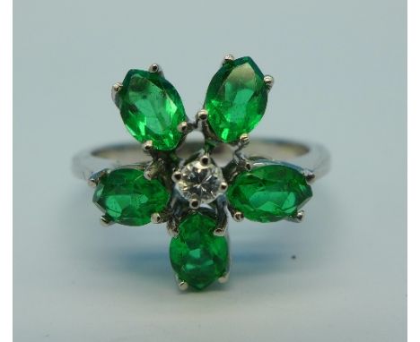 An 18ct gold, emerald and diamond ring, 4.6g, M