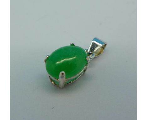 A silver and jade pendant