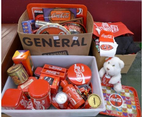 Three boxes of Coca-Cola advertising items including bottles, tins, clock, etc.