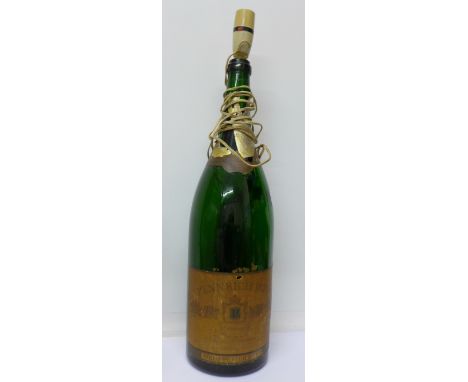 A Pennrich 1874 champagne bottle converted to a table lamp