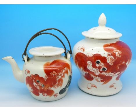 A Qing red dog decorated teapot and caddy, teapot lid a/f