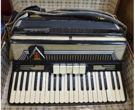 A Frontalini accordion, cased
