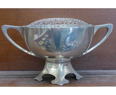 A Scottish Arts and Crafts silver rose bowl, Hamilton and Inches, Edinburgh 1911, 34.75oz, 1078g, width with handles 34cm