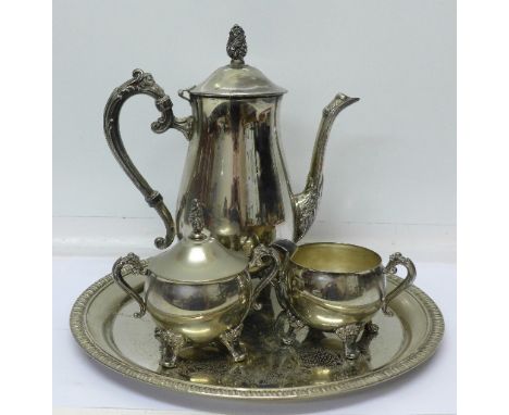A plated three piece tea service and a plated tray