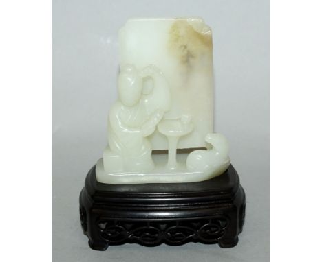 A CHINESE PALE CELADON JADE-LIKE GROUP, together with a fitted wood stand, depicting a seated lady with her dog before a scre