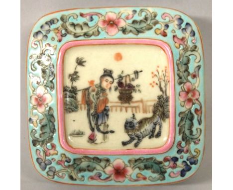 A CHINESE FAMILLE ROSE PORCELAIN BOX & COVER, of square section with rounded corners, the cover with a panel of the Immortal 