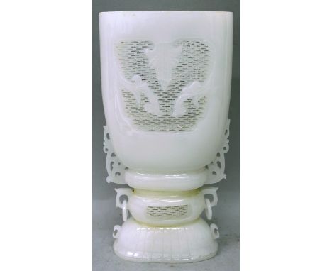 A CHINESE WHITE JADE-LIKE VASE, of oval section on a lotus plinth, the sides with pierced floral and trellis panels, and with