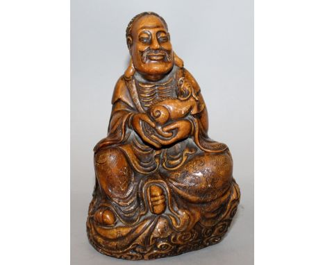 A GOOD QUALITY 19TH CENTURY CHINESE CARVED SOAPSTONE IMMORTAL, seated on a cloud scroll base and holding a mythical animal, t