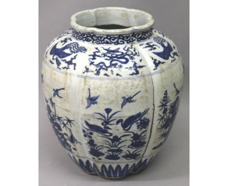 A LARGE CHINESE MING STYLE BLUE & WHITE PORCELAIN JAR, the lobed sides decorated with scenes of ducks in a lotus pond alterna