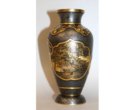 A FINE QUALITY SIGNED JAPANESE MEIJI PERIOD INLAID MORIGUCHI KOMAI STYLE IRON VASE, the sides decorated in inlaid gold and si