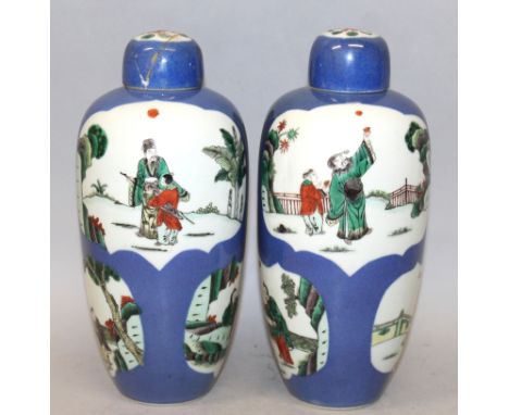 A GOOD MIRROR PAIR OF 19TH CENTURY CHINESE FAMILLE VERTE POWDER-BLUE GROUND PORCELAIN JARS & COVERS, each painted with ruyi-f