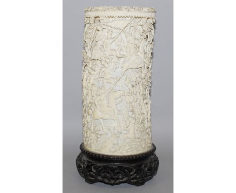 A FINE QUALITY 19TH CENTURY CHINESE IVORY TUSK VASE, together with a fixed carved and pierced hardwood stand, the sides carve