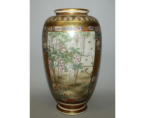 A GOOD QUALITY SIGNED JAPANESE EARTHENWARE VASE BY RYOZAN, the sides of the ovoid body painted in enamels and thick gilding w