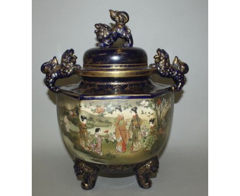 A LARGE SIGNED JAPANESE MEIJI PERIOD HEXAGONAL SECTION SATSUMA EARTHENWARE TRIPOD KORO & COVER BY KINKOZAN, the sides painted