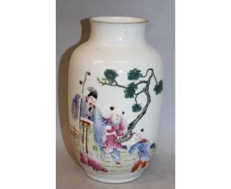 AN EARLY 20TH CENTURY CHINESE FAMILLE ROSE PORCELAIN LANTERN VASE, the sides painted with a scene of a sage and two boy atten