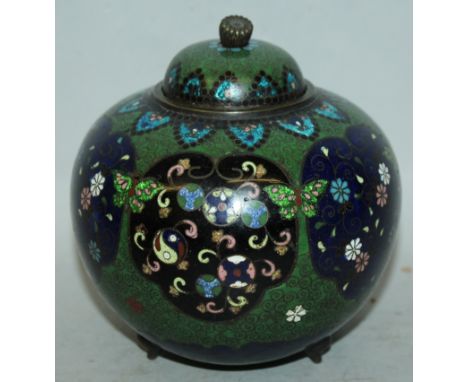 A SIMILAR SMALLER EARLY 20TH CENTURY JAPANESE CLOISONNE TRIPOD JAR & COVER, decorated with shaped ruyi-form floral and rounde
