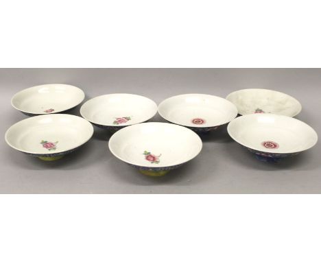 A GROUP OF SEVEN SIMILARLY DECORATED 19TH/20TH CENTURY PORCELAIN BOWL COVERS, each painted with roundels of precious objects 
