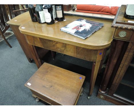 A 19th century mahogany card table having 'd' baize lined top on tapered gate legs