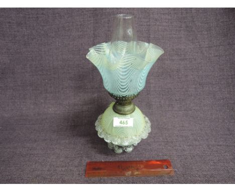 A 19th century glass table oil lamp of Venetian lattice designMarks to shade, base chipped. 2" diameter