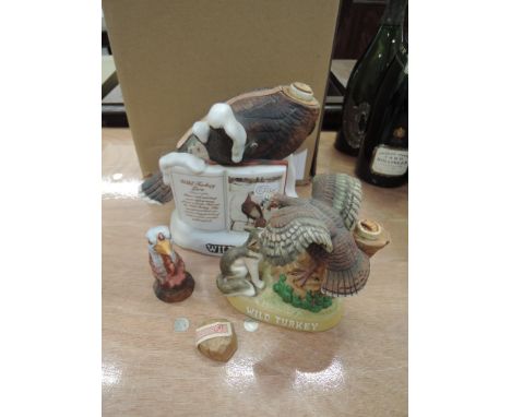 Two ceramic bottles of Wild Turkey Whiskey, large bottle modelled as a turkey with whiskey inside, small bottle modelled as t