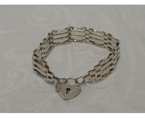 An HM silver four bar gate bracelet with padlock clasp