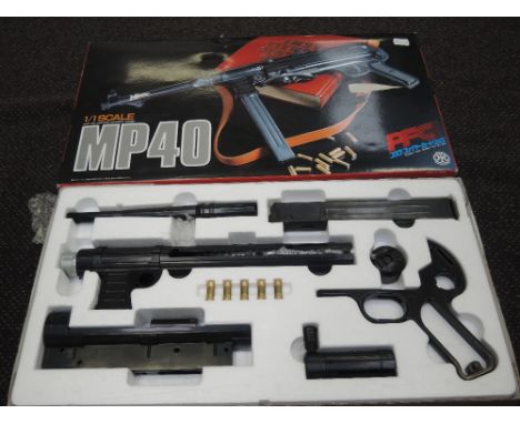 A Marushin Industry 1/1 scale MP40 blank fire replica machine pistol