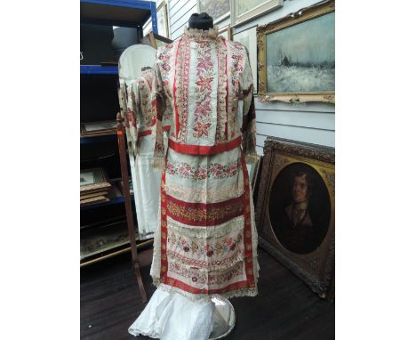 A beautiful colourful antique blouse and apron with extensive intricate cross stitch and lace work throughout.smaller size,po