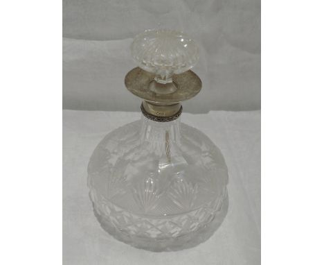 A cut glass decanter of onion form having a shaped silver collar, Birmingham 1923, Hukin &amp; Heath