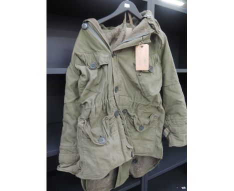 An army parka with attachable hood
