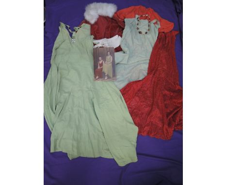 A selection of vintage 1930s items including a mint green dress with matching slip, a red bolero/blouse, a sheer red lace dre