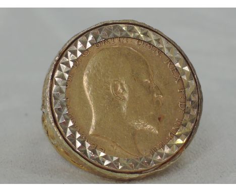 A 1904 half gold sovereign in a 9ct gold ring mount,  approx 8.8g,  size O/P