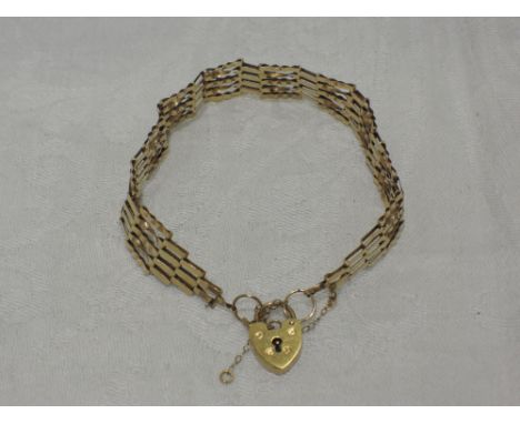 A 9ct gold 5 bar gate bracelet with padlock clasp weight 5.5g
