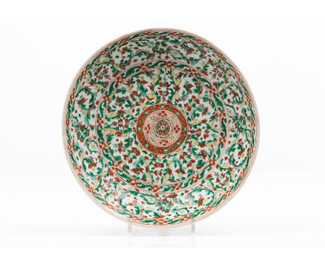 A large charger Chinese export porcelain Polychrome "Famille Verte " enamelled decoration with floral pattern  On a channel f