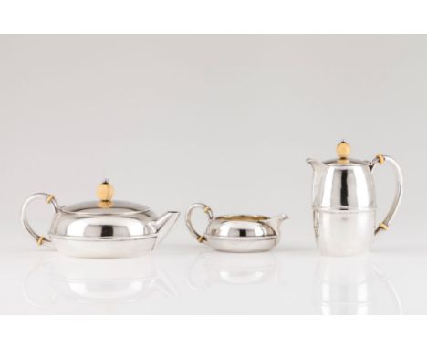 An Art Deco tea and coffee setPlain body of transversal reliefs frieze and plain volute handles Bone type lid pommel and heat