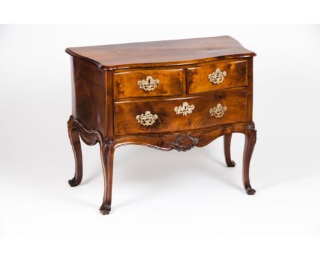 A D.José commodeWalnut Carved decoration with 2 short and two long drawers Carved and scalloped apron of baroque motifs On fo