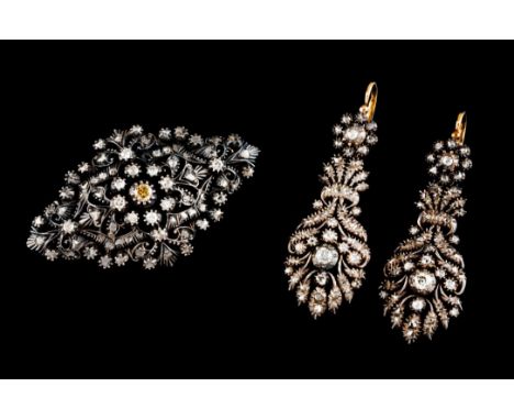 A pair of Romantic era  drop earrings and broochSilver and gold Pierced decoration of stylised foliage motifs set with antiqu